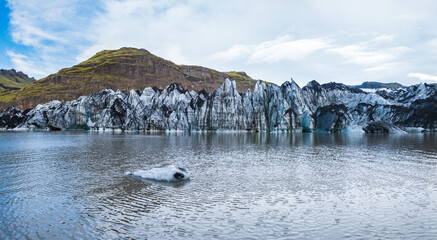 Sólheimajökull picturesque glacier in southern Iceland. The tongue of this glacier slides from...
