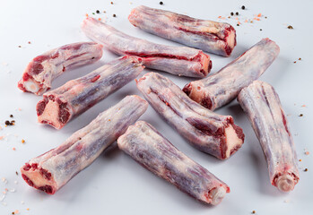 raw beef tails on a light background close-up