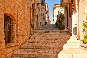 A street among the characteristic houses of Buonalbergo, a mountain village in the province of Benevento, Italy.