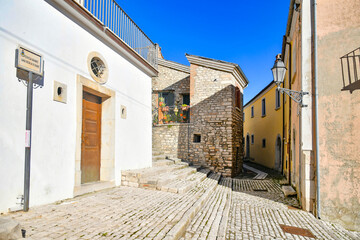 A street among the characteristic houses of Buonalbergo, a mountain village in the province of Benevento, Italy.