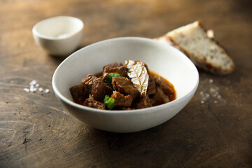 Traditional beef ragout with bay leaf