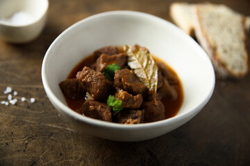 Traditional beef ragout with bay leaf