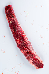Fresh and raw beef meat. Whole piece of tenderloin ready to cook on white background