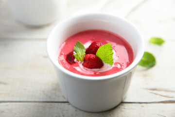 Refreshing cold raspberry soup with fresh mint