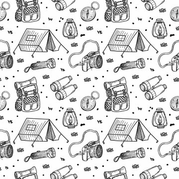 A seamless pattern of hand-drawn doodle-style elements. Illustration for local tourism. Tent, backpack, flashlight, compass, lamp and binoculars. Vector image of hiking on white background.