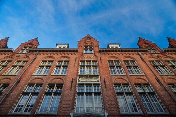 Facade of an old historic building in the city centre of Bruges in Belgium