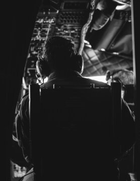 A crew member of an Alenia C27J Spartan military cargo plane during a drill exercise.
