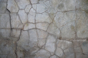 Stone wall background. Cracked concrete. Cracked concrete wall. Stone wall texture.