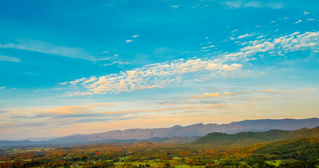 Beautiful landscape mountain green field grass meadow white cloud blue sky on sunny day. Majestic green scenery big mountain hill cloudscape valley panorama view in countryside greenery pasture