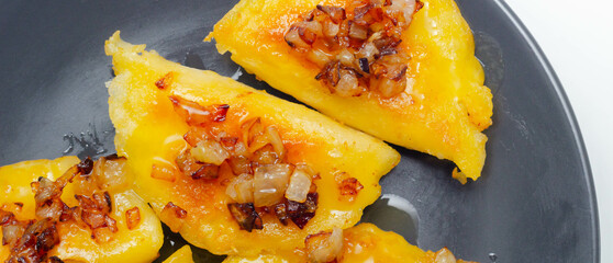Close up of dumplings sprinkled with fried onion, traditional Polish, Russian and Ukrainian cuisine