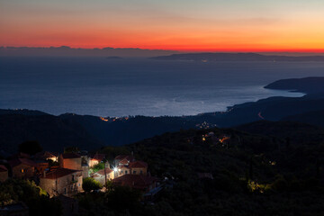 Fototapeta premium Beautiful sunset view of Messinia gulf from the mountainous village of Tseria, in the famous Mani region, in Peloponnese, Greece, Europe.