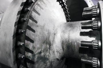 The rotor of a gas turbine compressor with a bolted coupling half