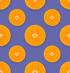 Seamless pattern from juicy slices of tangerine or orange on Very Peri colors background. Design elements with Very Peri trend color. Concept ideas of 2022