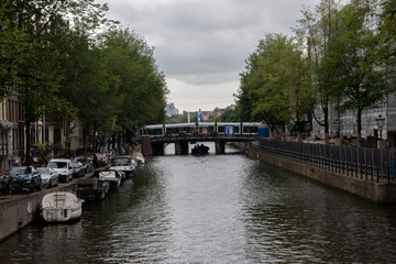 Fototapeta na wymiar View From The Bridge At The Leidesgracht Canal Seeing The Prinsengracht Canal At Amsterdam The Netherlands 2-9-2022