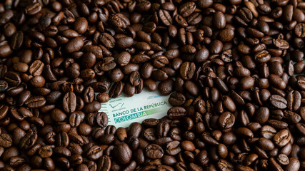 Colombian coffee with Colombian hundred money