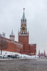 Spasskaya Tower of the Kremlin with chimes on a cold snowy day