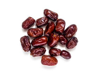 Top view of handful of dates on white background