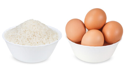 Rice and chicken eggs on isolated white background. 