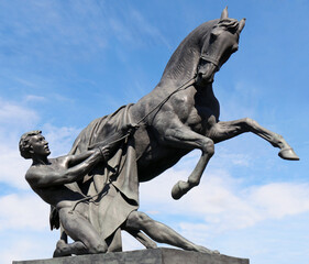  Horse Tamer statue on Anchovy Bridge by Peter Clodt, St. Petersburg, Russia