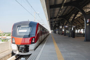 Fototapeta premium high-speed train is parked in the station waiting to pick up passengers