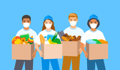 Young volunteers, boys and girls in masks stand and hold boxes with goods for charity such as food, clothes, shoes, toys. Charitable organization workers give humanitarian aid for people in need.