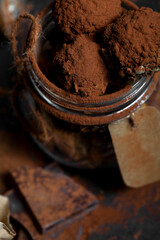 chocolate truffles, homemade on a black graphite background