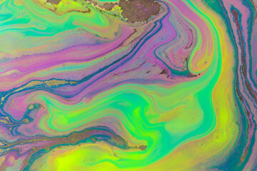 Streams of liquid purple and green inks background. Waves of fluid vivid fluid paint.