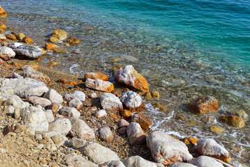 View of Dead Sea coastline. Salt crystals at sunset. Texture of Dead sea. Salty sea shore. Landscape Dead Sea coastline in summer day,  failures of the soil