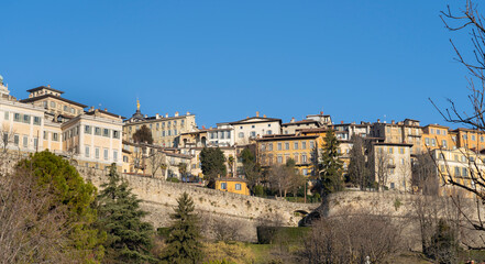 Fototapeta na wymiar Bergamo, Italy. Amazing landscape at the old town located on the top of the hill. View from the new city (downtown). Bergamo one of the most beautiful city in Italy. Touristic destination