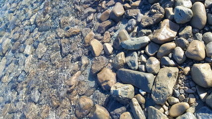View of Dead Sea coastline. Salt crystals at sunset. Texture of Dead sea. Salty sea shore. Landscape Dead Sea coastline in summer day,  failures of the soil