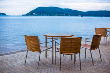 Fototapeta premium The background of a new design chair placed on the balcony of the resort for customers to sit and rest during the day.