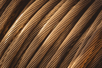 Background of wooden coils of electric cable outdoor.
