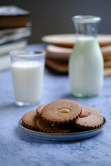 Home baked ginger cookies and milk