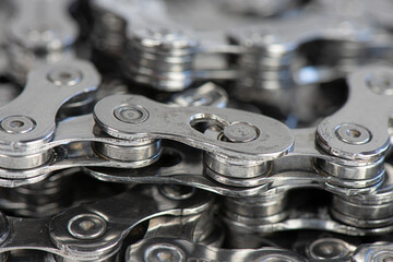 Bicycle chain with quick link full frame closeup.