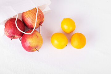 Delivery healthy food background. Vegan vegetarian food in paper bag fruits on white, copy space, banner