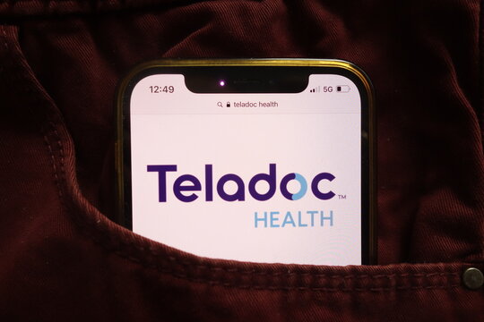 KONSKIE, POLAND - January 15, 2022: Teladoc Health Inc logo on mobile phone hidden in jeans pocket