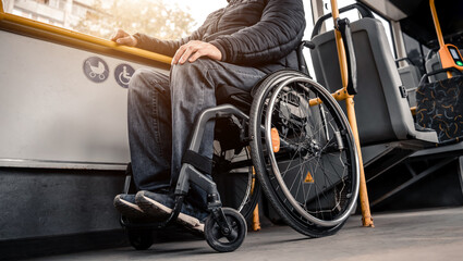 Fototapeta na wymiar Person with a physical disability inside public transport with an accessible ramp.