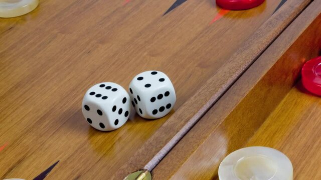 Close-up of a backgammon board with dice