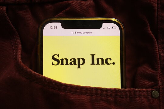 KONSKIE, POLAND - January 15, 2022: Snap Inc Logo On Mobile Phone Hidden In Jeans Pocket