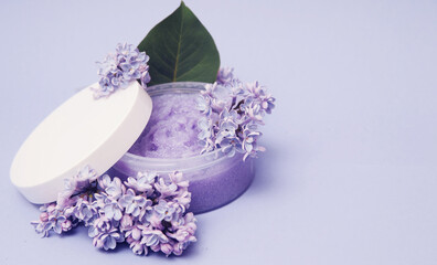 Obraz na płótnie Canvas scrub with a lilac petals on background with a copy space. 