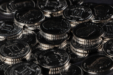 Ukrainian hryvnias coins. Background from Ukrainian coins 10 hryvnia. Money and finances.