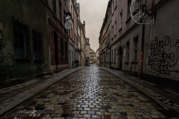 Fototapeta premium An old town alley close to the renaissance market square in Poznan, west-central Poland