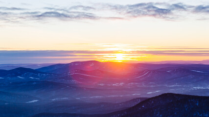 Blurred background of beautiful mountain landscape with amaizing sunset