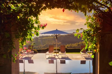 Fotobehang Toscane View at sunrise through hidden gate  © RRA