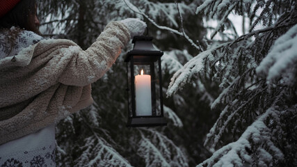 Beautiful candle near the Christmas tree