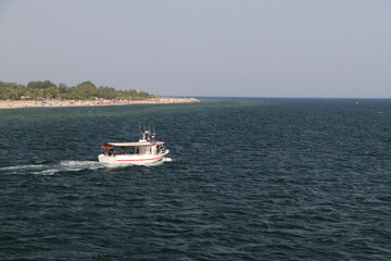 Boat cruising on the calm sea