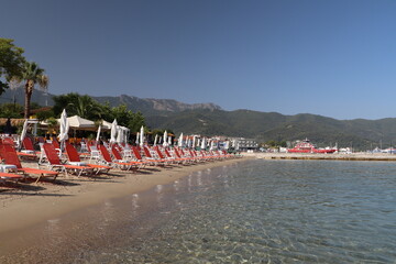 Sun beds on the beach side