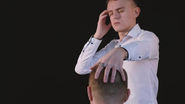 Telepathy. The telepath reads the patient's mind and puts him into a trance