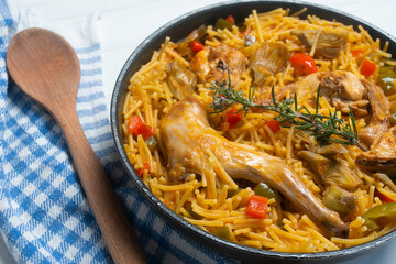 Noodles with noodles, artichokes and other vegetables. Traditional north spain dish.