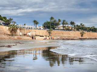 Fototapeta na wymiar Vega Baja del Segura - Orihuela Costa - Punta Prima: su playa, paisaje y torre.